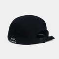 Detail view of black docker hat featuring nylon strap buckle and white embroidery - Adjustable / Black