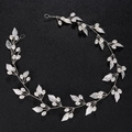 Silver bridal hair vine featuring delicate metal leaves and white faux pearls on black base - Silver Artificial Pearl Leaf Hair Band (HS-J4419S)