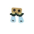 Detail of UFO acrylic earrings with sparkling black disk and transparent blue beam with cow - Black Glitter UFO Abducting Cow Style(1C67)