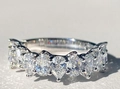 Elegant silver ring with pear and oval cut sparkling cubic zirconia in a pave setting - Ur0732