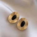 Pendientes ovalados dorados vintage con esmalte negro y diseño de ondas texturizadas - Dorado Negro Ovalado