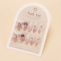 Detail of pink gradient press-on nails with 3D bows, butterfly motifs and rhinestones - By1737 / Glue Type