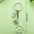 Schlüsselanhänger mit blauem Meerjungfrauen-Glitzerschwanz und kleiner Flasche mit Muscheln - LS175 Blau Glitzer Schwanz