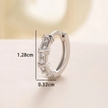 Silver huggie earrings with cubic zirconia and X motif detail, 1.28cm height - White