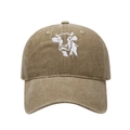 Detailed close-up of cow embroidery on vintage washed cotton baseball cap - Adjustable / Khaki