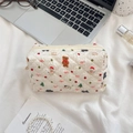 Close-up of quilted cosmetic bag with cute Christmas bear and snowman patterns - Snowman Bear