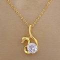 Macro shot of gold swan pendant necklace featuring a large sparkling cubic zirconia crystal - Gold Swan Style (F211)