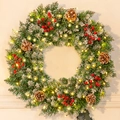 Flocked Christmas wreath with LED lights, pine cones, and red berries for festive decor - Timer Waterproof Battery Light (SYWT004)