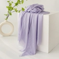 Light purple linen cotton scarf with tassels draped over a white minimalist prop - Light Purple