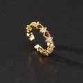 Close-up of golden adjustable ring with hollow hearts and rectangular zircon stones - Hollow Heart Baguette Zirconia Alternate