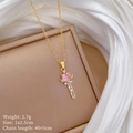 Titanium gold necklace with pink heart zircon wand pendant on white silk background - Sailor Moon Style Magic Wand Style (E354)