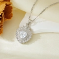 Detail of silver heart pendant with sparkling zircon on elegant silk fabric background - Silver Sunflower Triangle White Zircon Necklace (T021)