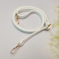 Detail of adjustable white litchi pattern PU leather strap with golden metal buckles - White