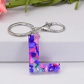 Letter L resin keychain with colorful stones, metal ring and lobster clasp detail - Letter L
