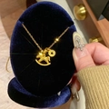 Golden double pendant necklace with rocking horse and coin on blue velvet display - Honeycomb Rocking Horse with Round Coin Style (15#)
