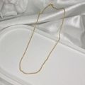 Elegant gold-plated S925 silver O-chain necklace on a white silk display stand - Gold Shimmer O-Chain (45CM)