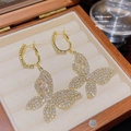 Elegant gold butterfly drop earrings with shimmering crystals on velvet display - Gold Full Zircon Butterfly Earrings (E0090)