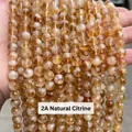 Handheld bundle of natural 2A grade yellow tower crystal round beads for DIY jewelry - 2a Natural Yellow Tower Crystal / 10mm approx 37pcs