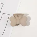 Detailed view of matte milk tea butterfly hair claw clip with sturdy styling teeth - 4cm / 4cm Butterfly-Light Coffee