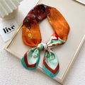 Elegant 70cm square silk scarf with vintage orange and red floral print and knotted drape - Deer King Orange