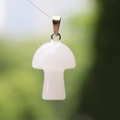 Single white gemstone mushroom pendant with a silver metal clasp on clear cord - White Jade