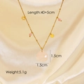 Detail view of 40+5cm gold titanium necklace with pink teardrop stone and star charm - Rose Quartz