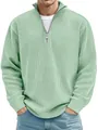 Detail of mint green ribbed polo shirt featuring a quarter-zip stand collar and textured fabric - S / Tops / Green