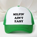 Green and white mesh trucker hat with MILFIN AINT EASY slogan print on front - Green