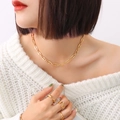 French style gold chain necklace and stacking rings set worn on a white sweater - Gold Chain Necklace & Ring Combination-P1162