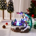Close-up of a festive Christmas fountain house with LED lights and snow scene detail - Fountain Christmas Tree Style