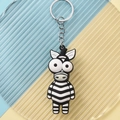 Detailansicht eines Zebra-Schlüsselanhängers aus PVC-Weichgummi mit großen Augen - Zebra