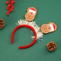 Festive Christmas Santa headband with colorful tassels and sequins on green background - Santa Claus