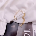 Collana con perle barocche e catena cubana dorata con chiusura a levetta minimalista - Bracciale