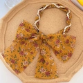 Floral print headband with yellow bow and white pearl chain woven ribbon details - Yellow