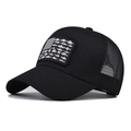 Black American flag fish trucker hat with breathable mesh and 45-degree angle side view - Solid Black (Black Flag Fish)