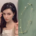 Cerchietto sottile in lega dorata con orecchie di coniglio in strass e ciondoli a stella - Coniglio In Strass Dorato