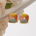 Colorful enamel woven ball earrings in gold frame set on a reflective surface - Multicolor Splicing