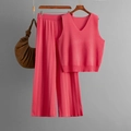 Detail of fuchsia knit set featuring a V-neck vest and wide-leg pants on a wooden hanger - One Size / Watermelon red