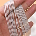 Strand of 2mm faceted clear crystal glass beads for DIY jewelry making and handcrafting - 1 Strand Approx. 200 Pieces/Pack (2mm) / AB White