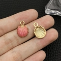 Detailed view of pink enamel shell charms with golden metal back for DIY jewelry making - Pink Enamel Ocean Shell (Small)