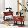 Carillon vintage a macchina da cucire con venature del legno sopra dei libri - YL1010 Carillon Macchina da Cucire