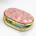 Vintage oval folding mirror with pink floral fabric cover and golden metal carved edges - Oval Shape / Oval Orange