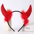 Detail view of red devil horn headband with sequin accents and soft feather decoration - Red Felt Horns + Red Feather + Black Headband