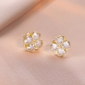 Sparkling four-leaf clover stud earrings with golden finish and clear heart-shaped zircons - Rotatable Clover Earrings (E1103) / White Zircon/Gold