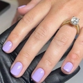 Lavender press-on nails shown with a large round diamond ring on black leather - Lavender Purple Glossy (CW518)
