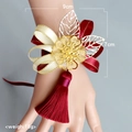 Chinese wedding wrist corsage with red and white silk flowers and gold leaf accents - Wrist Corsage