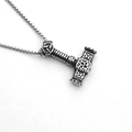 Close-up of silver Thor's hammer Mjölnir pendant with Celtic knots on a box chain - Celtic Knot Thor's Hammer Style