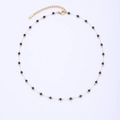 Detail of beaded necklace with gold chain and black round beads with lobster clasp - Small Black Round Beads With Long Tag