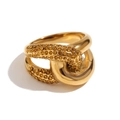 Gold plated double layer crossover flower ring with amber crystals on white background - US 6 / Criss-Cross Knot Two-Tone Zirconia Ring / Gold Champagne