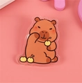 Cute brown capybara acrylic badge with yellow fruit on a soft pink background - No.8 Capybara